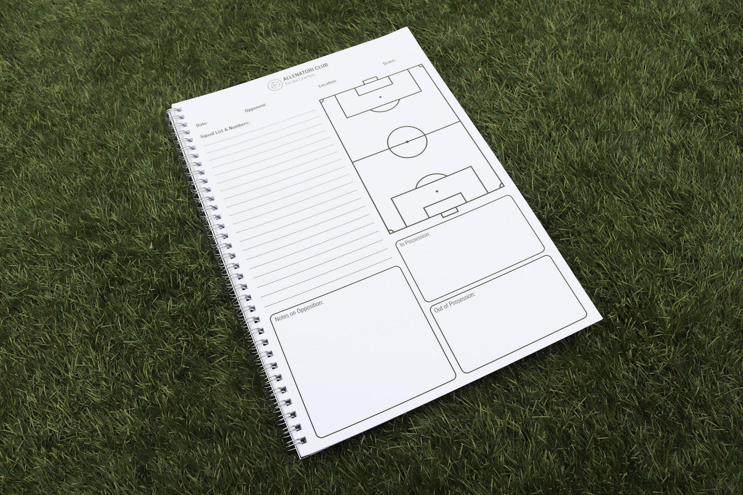 Open Allenatori Club Match Day Planner on grass with squad list lines, football pitch diagram, and tactical note sections.